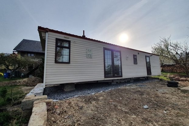 Usadený mobilný dom